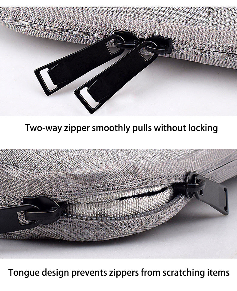 Close-up of a gray waterproof laptop sleeve featuring two-way zippers and a tongue design to prevent scratching.