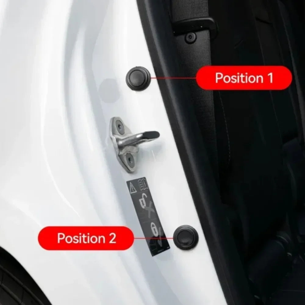 Close-up of a white car door showing two positions for universal anti-collision silicone pads.