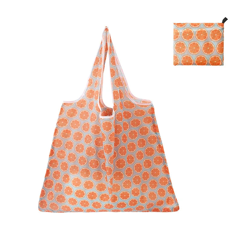 Orange and gray patterned reusable shopping tote bag with a matching carry pouch