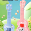 A pink ukulele toy guitar with a cat face design and a blue ukulele toy guitar, both featuring adjustment knobs.