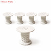 Five white flexible hair catcher drain covers for sinks and tubs displayed individually.