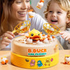 A child is interacting with a cake decorated as a duck and friends game set.