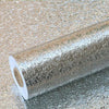 Roll of self-adhesive aluminum foil wallpaper used as a waterproof and oil-proof kitchen backsplash liner