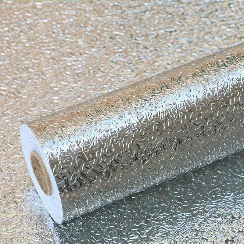 Roll of self-adhesive aluminum foil wallpaper used as a waterproof and oil-proof kitchen backsplash liner