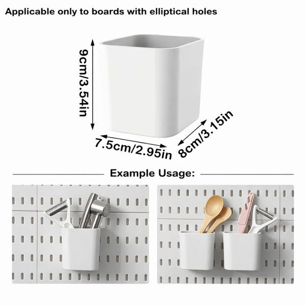 White wall-mounted organizer with elliptical holes for storing tools and items on a pegboard.
