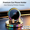 A premium car phone holder with an RGB ambient light and auto-clamping feature shown on a car dashboard.
