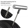 A silver tool is shown enlarging a puncture in a tire tread.