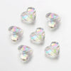 A collection of twenty clear iridescent acrylic heart-shaped beads for jewelry making