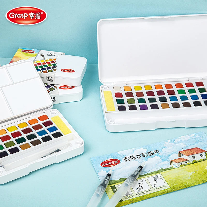 A white paint set for watercolor painting is shown with various color palettes and water brush pens.
