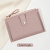 A light lilac purple women's slim PU leather card holder wallet with a gold zipper and stitched edges.