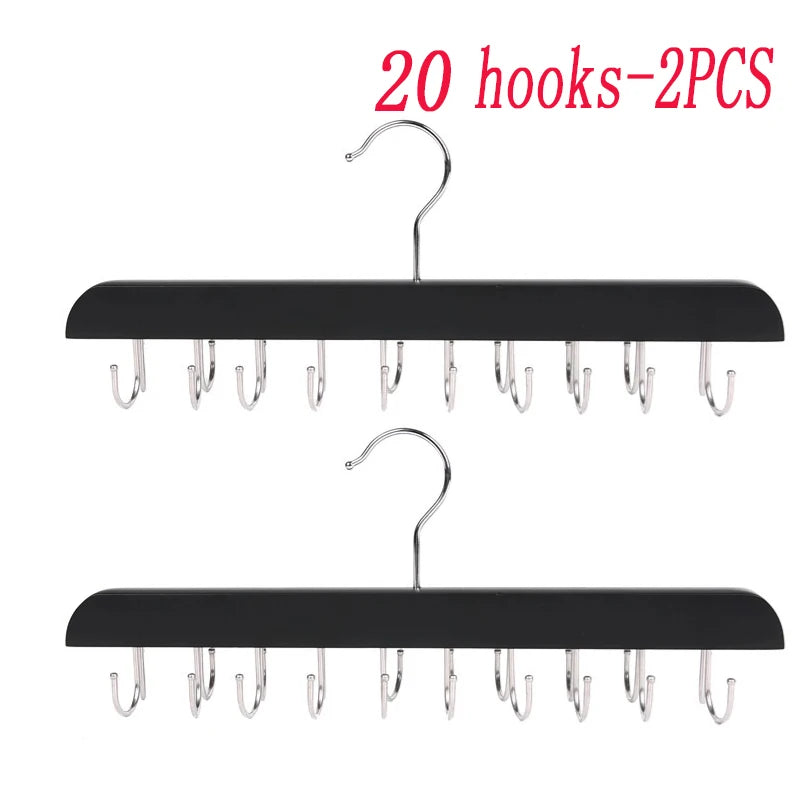 A set of 20 black hooks for hanging belts, hats, and accessories.