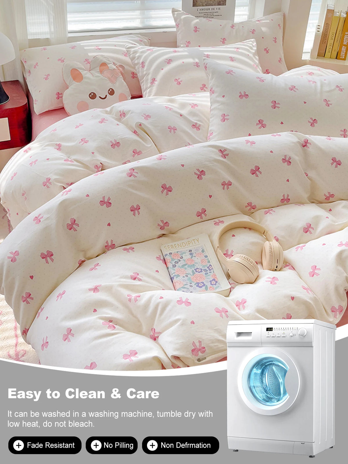 A set of pink duvet covers and pillows with a tiny bow print displayed on a bed.