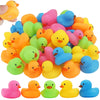A collection of colorful mini rubber ducks in various shades including yellow, pink, green, and blue.