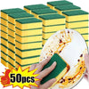 A set of 50 green and yellow double-sided cleaning sponges stacked in rows, with a hand holding one sponge next to a plate st