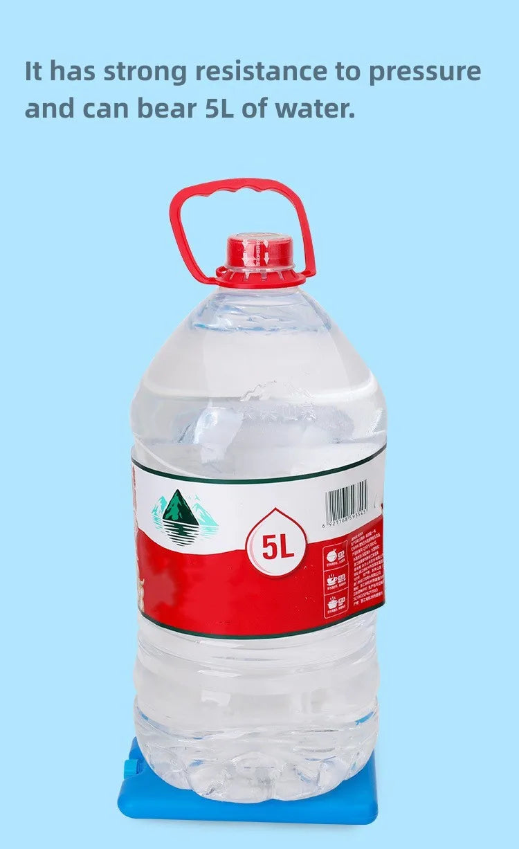 A clear plastic water bottle with a red cap and a red label showing 5L capacity, resting on a blue base.