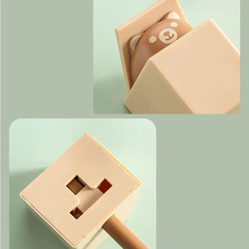 A beige cat-shaped adhesive hook is shown in two views, demonstrating its design and size.