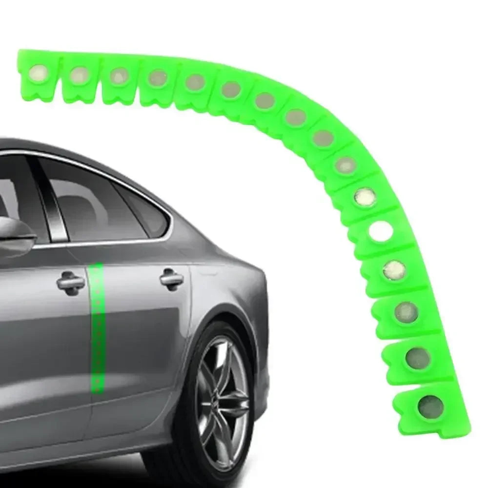 A bright lime green magnetic dry grinding protective strip is shown curved over a silver car body.