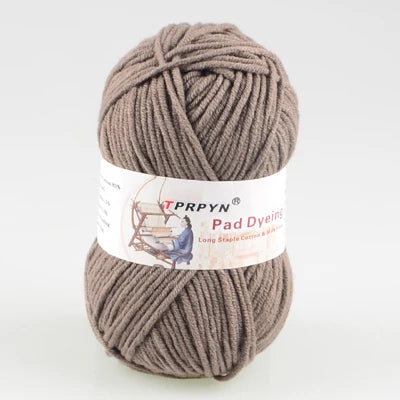 A ball of taupe colored TPRPYN Pad Dyeing yarn for knitting and crochet projects.