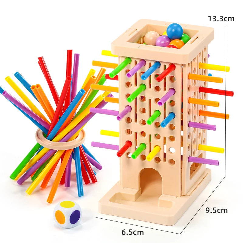A wooden pick-up sticks board game featuring colorful sticks and balls in a light pink container.