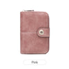 A pink vintage RFID blocking short wallet with a leather texture and zipper closure.