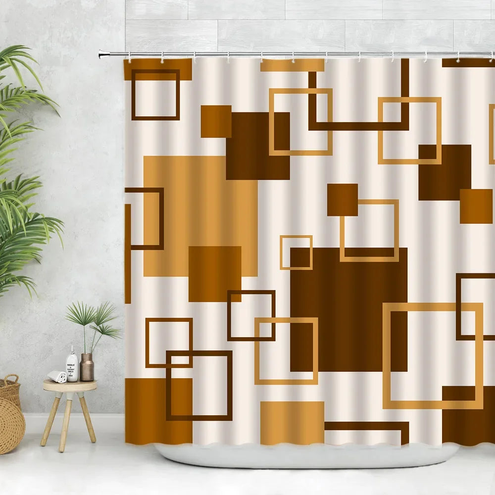 A beige fabric shower curtain featuring a geometric pattern of brown and gold squares.
