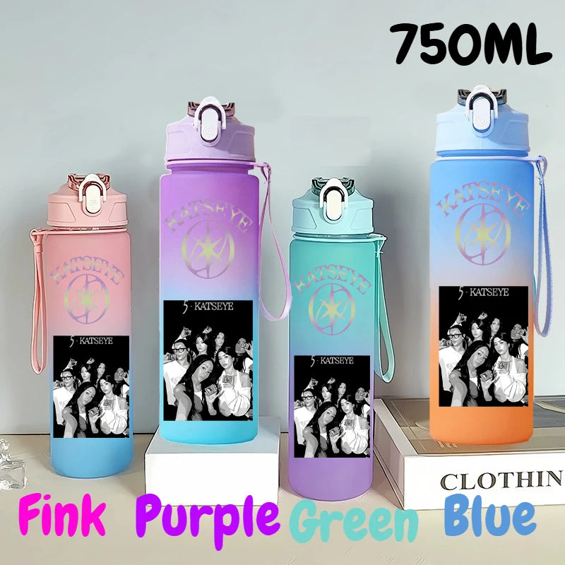 A set of three 750ml portable sports water bottles in pink, purple, green, and blue colors displayed on a white box.