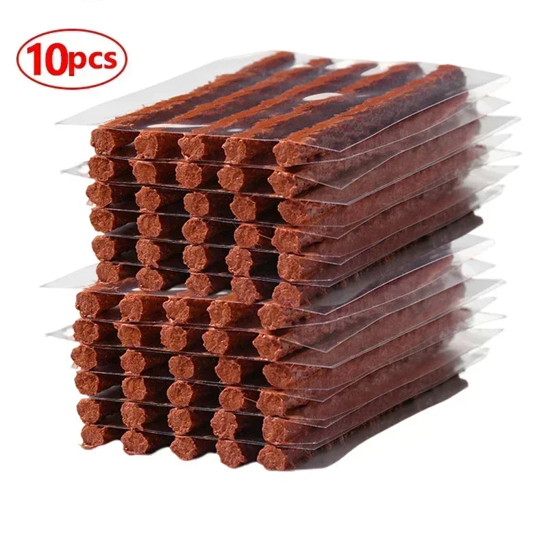 A package of 10 tubes of universal emergency tubeless tire repair kit in brown packaging.