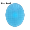 A small, round, translucent blue silicone ice face mask bowl with a textured surface.