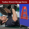 A hand is using a wrench on a tire while a red multi-slot storage rack for tools is displayed in a blue box.