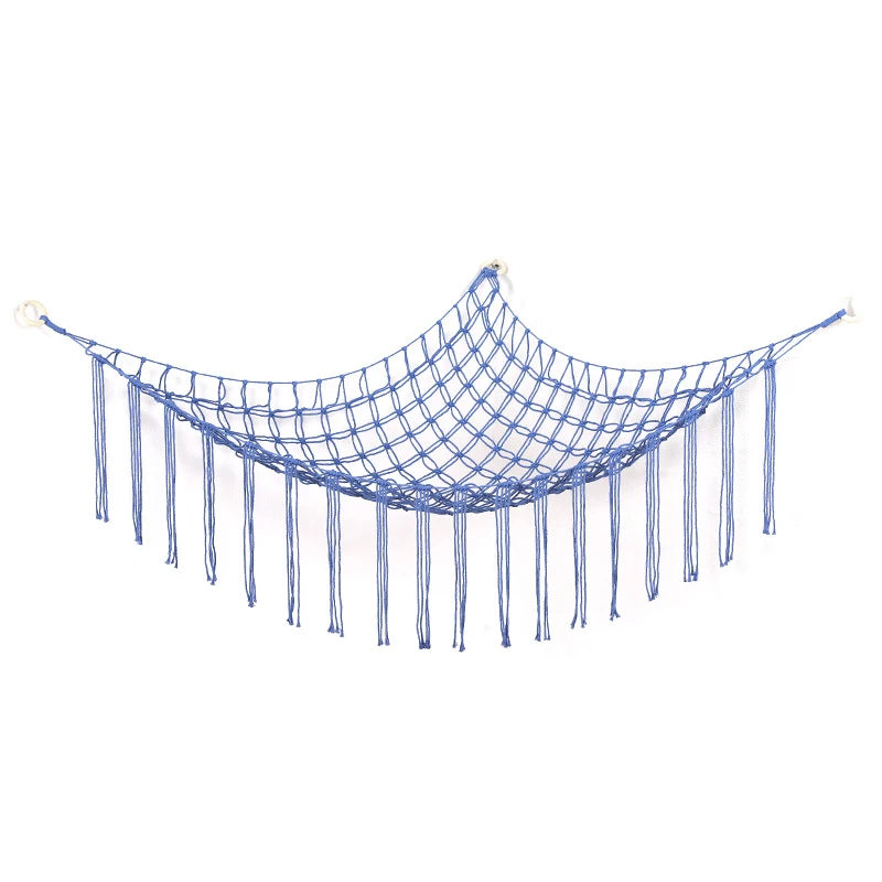 Blue mesh hammock with fringe, used as a hanging organizer for plush toys.