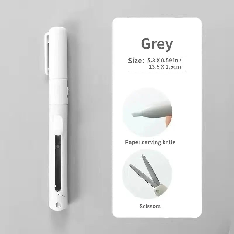 Grey paper carving knife and scissors tool displayed on a white background.