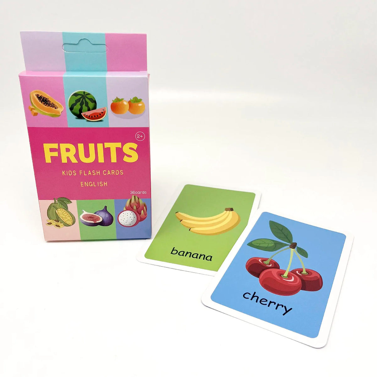 A box of fruit flash cards featuring images and names of fruits like banana and cherry.