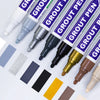 A collection of grout pens in various colors and shades, showing the tips and packaging.