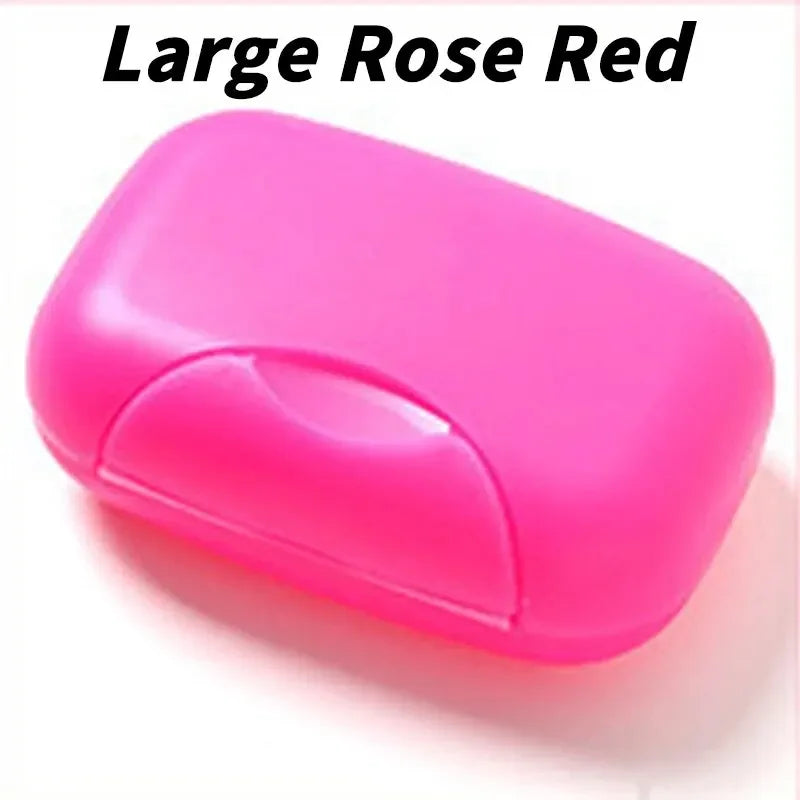 A large, pink, translucent portable soap holder with a lid shown in a close-up view.