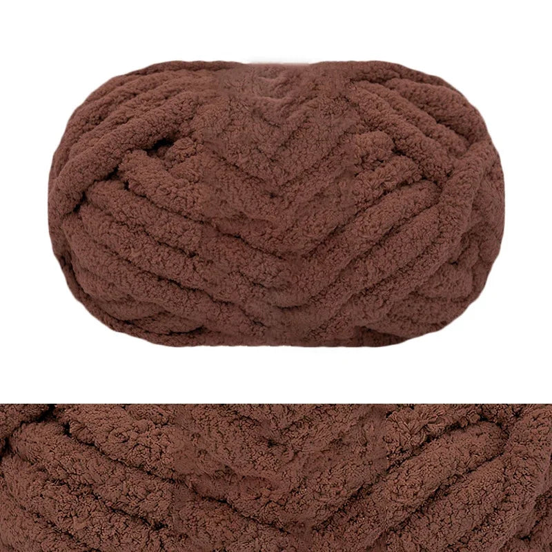 A ball of brown chunky chenille yarn used for hand knitting and crochet