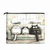 A canvas charger storage pouch featuring a watercolor illustration of several cats relaxing on a couch.