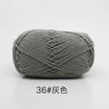A ball of gray 4-ply milk cotton yarn for knitting and crochet.