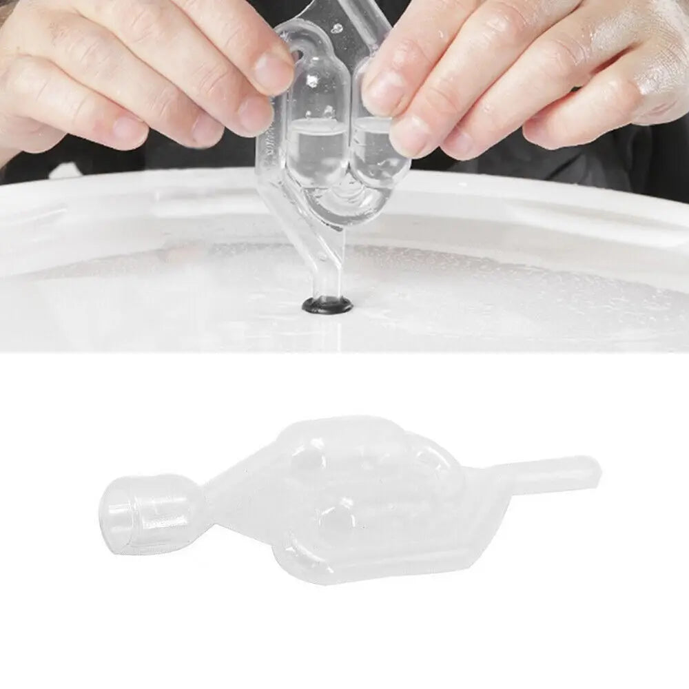 Hands are using a clear combustion leak tester kit with a glass tube to test for leaks.