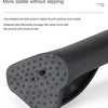 Close-up view of a black bicycle kickstand with a dot-shaped anti-skid bottom.