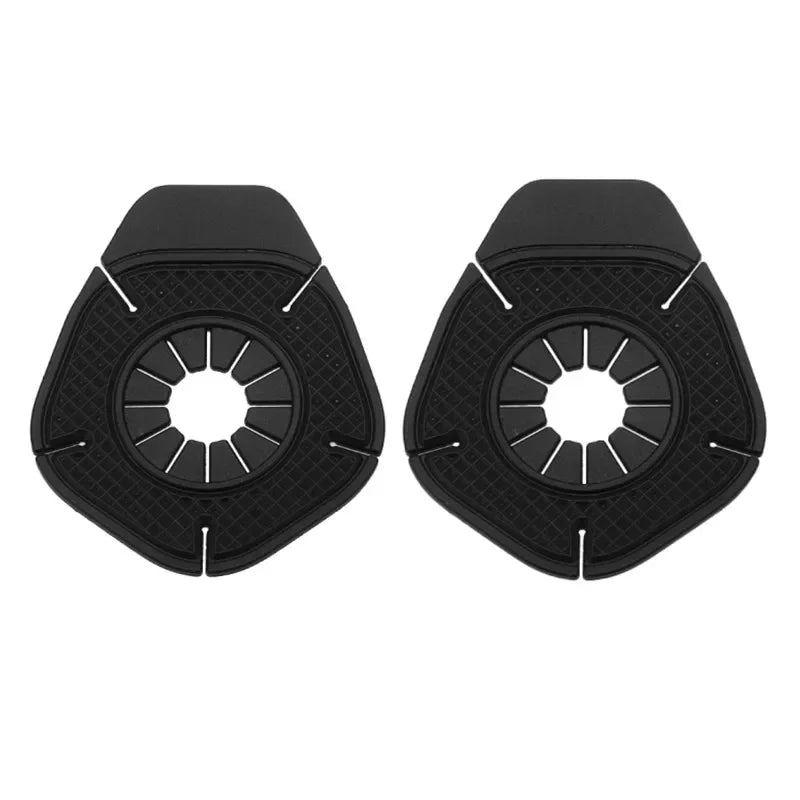 A pair of black silicone windshield wiper arm hole covers for a vehicle.