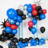 A balloon garland arch featuring blue, red, and black balloons arranged in an arch shape.