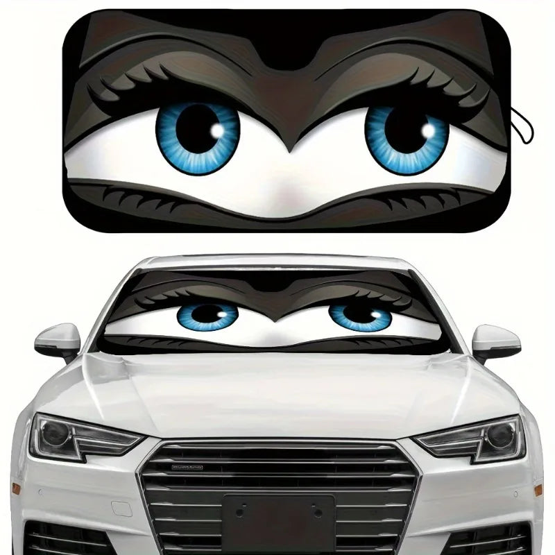 Close-up of a cartoon folding car sunshade featuring large blue eyes.