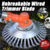 An orange and silver trimmer blade with a wire wheel brush is shown on a dark surface.