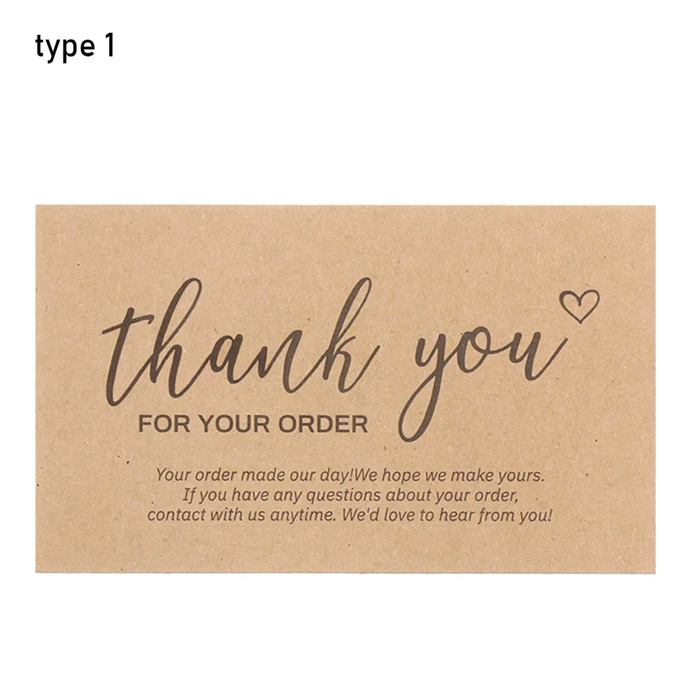 A thank you note card with handwritten text saying thank you for your order on kraft paper.