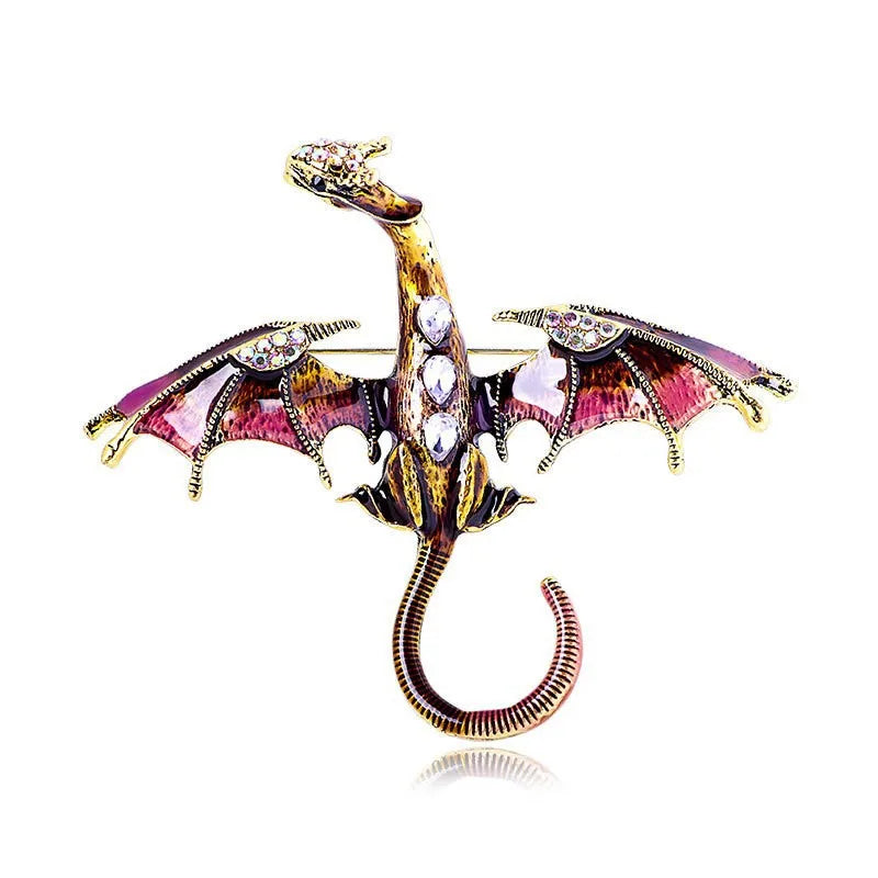 A detailed enamel dragon brooch featuring gold accents and sparkling rhinestones.