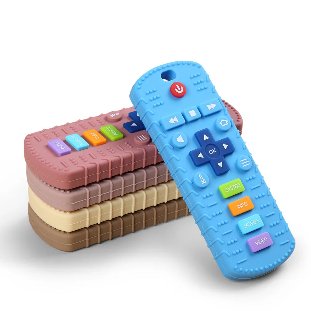 A blue silicone remote control teether with buttons for babies is shown next to several stacked silicone teethers.