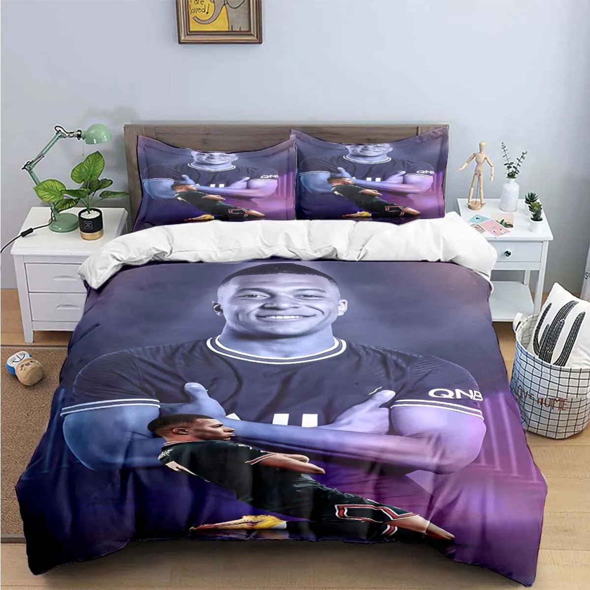 A purple soccer player graphic duvet cover featuring a smiling face and team logo.