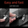 Close-up showing a hand opening a black fabric zipper with a metal slider replacement.