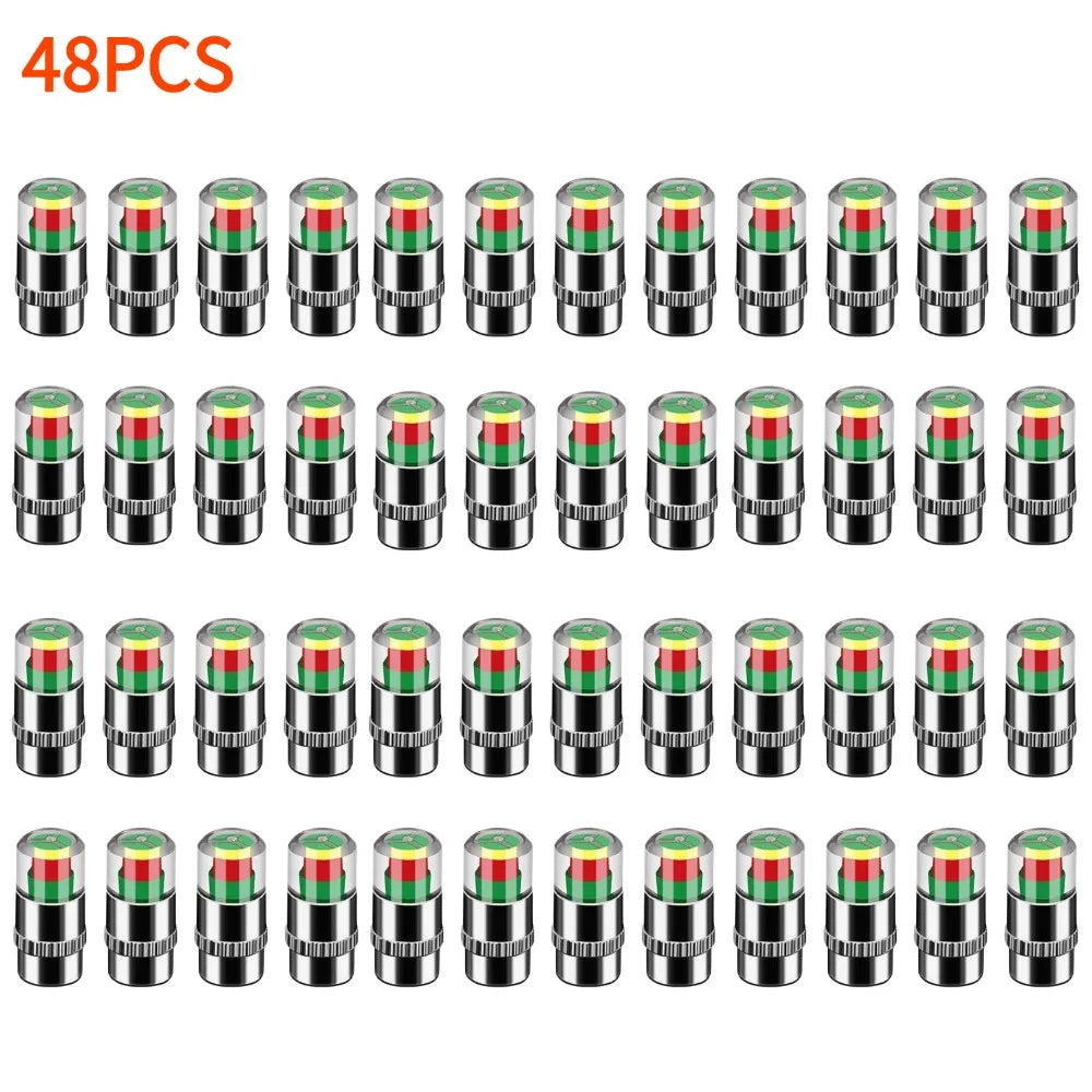A set of 4 color-coded tire pressure indicator valve caps for automotive use.