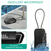 A black portable safe lock box with a steel cable and an all-round waterproof seal ring being tested in water.